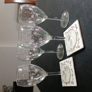 NWOT Never used.. Still in original box hand painted wine glasses with coasters